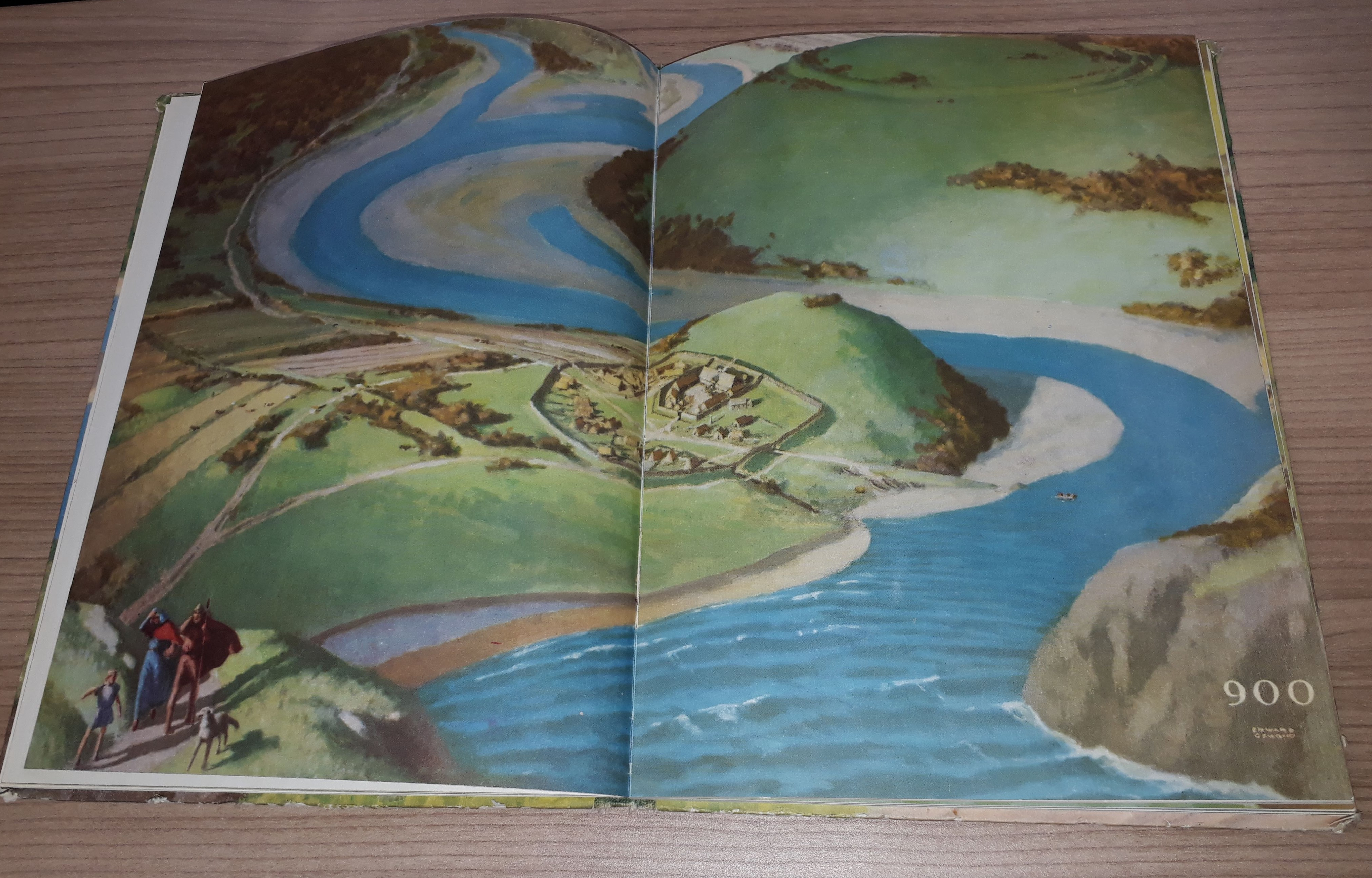 Double-page spread: colour illustration of a Saxon village in a valley, with a large river winding through the valley