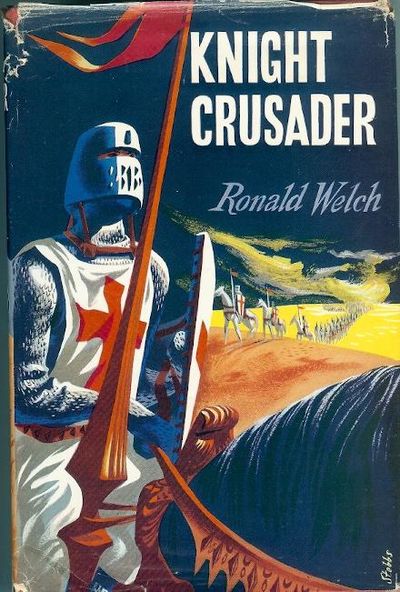 Book jacket: Ronald Welch, 'Knight Crusader'. Jacket depicts a mounted medieval knight in the foreground, with white surcoat emblazoned with a red cross. A train of horses crossing the desert is in the background.